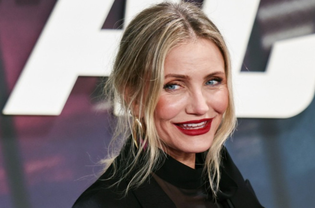 Kameron Dijaz u retkom izlasku sa suprugom